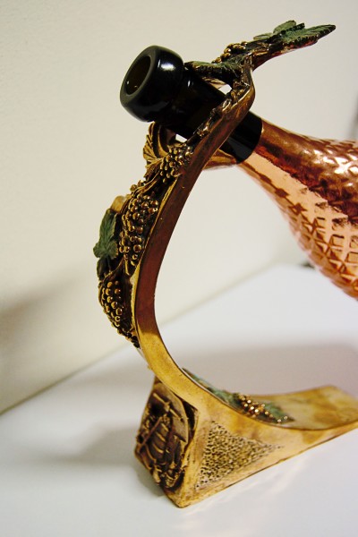 Golden colour bronze bottle holder - bronze and copper metal work